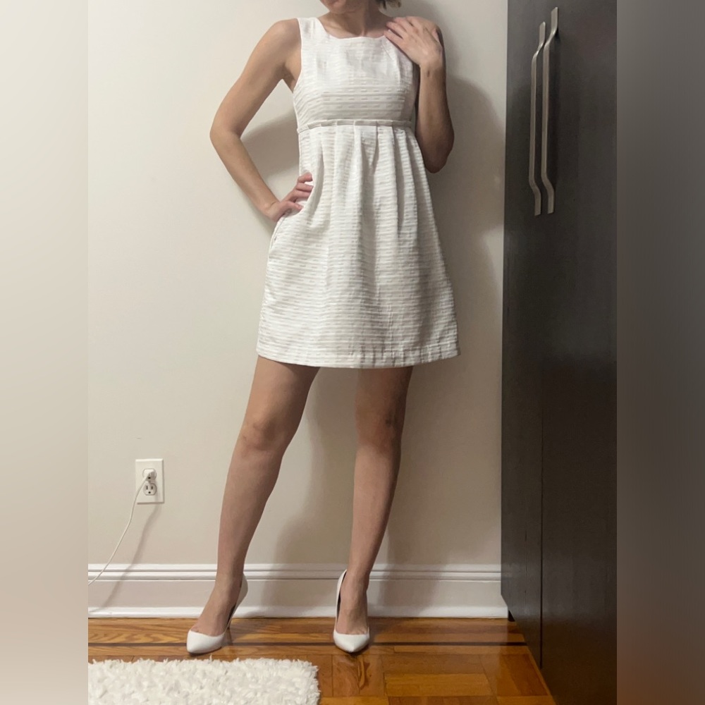 White mini cocktail dress in a good condition, size 4
